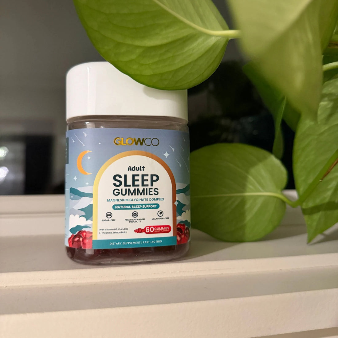 Glowco Adult Sleep Gummies jar on a shelf at home