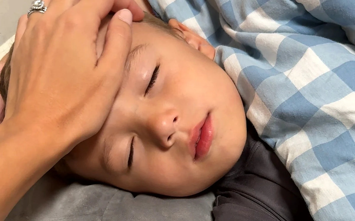 Children asleep in bed