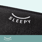 Front view of Glowco's black Sleepy Sleep Mask clearly displaying the branded "Sleepy" logo, designed for stylish comfort and restful sleep.