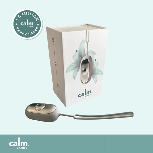 Image of the grey CalmCarry device for anxiety and insomnia relief, displayed next to its packaging box. A badge on the image states '1.5 Million Happy Users'.