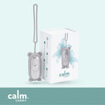 Grey CalmCarry Kids device with its box