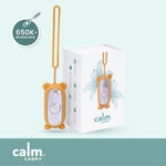 CalmCarry device with packaging on a light blue background
