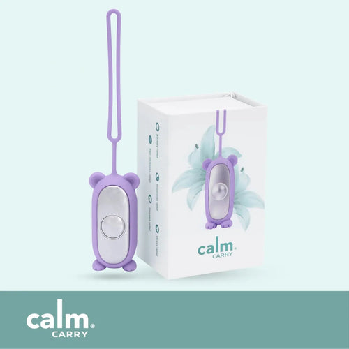 Purple CalmCarry Kids device with its box