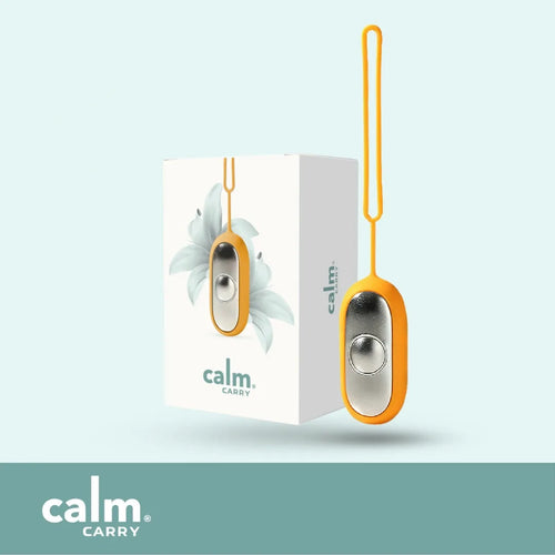 Orange CalmCarry device with its box