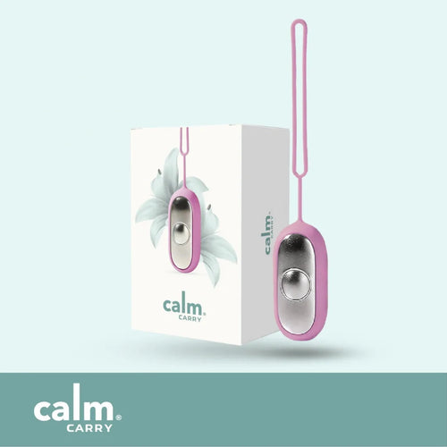 Pink CalmCarry device with its box