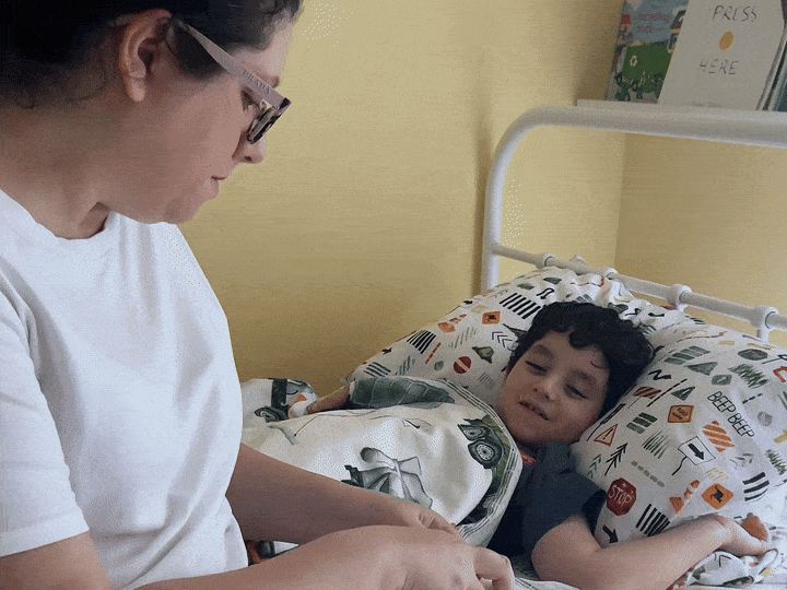 Jars of Glowco Kids Sleep Gummies at home
