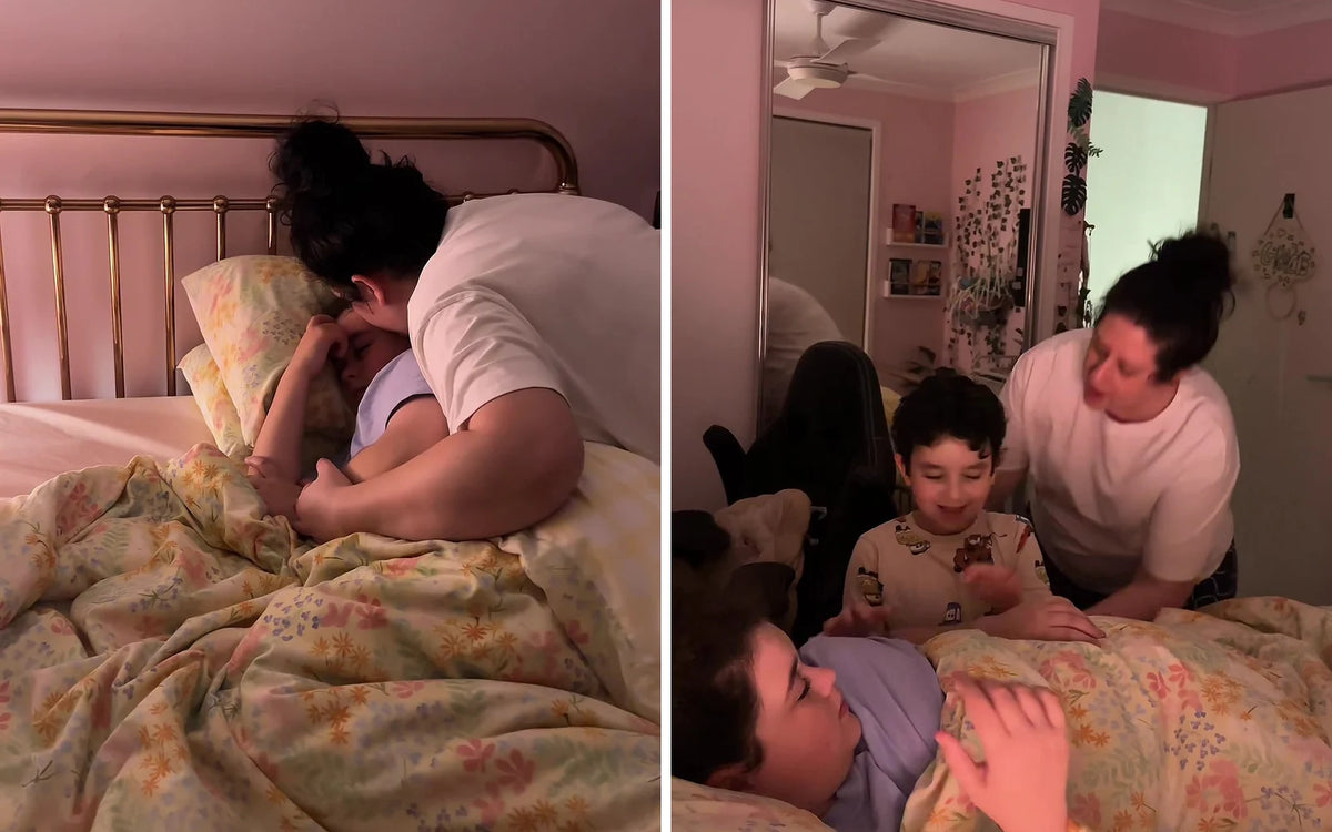 Raspberry sleep gummies in a parent's hands next to the jar